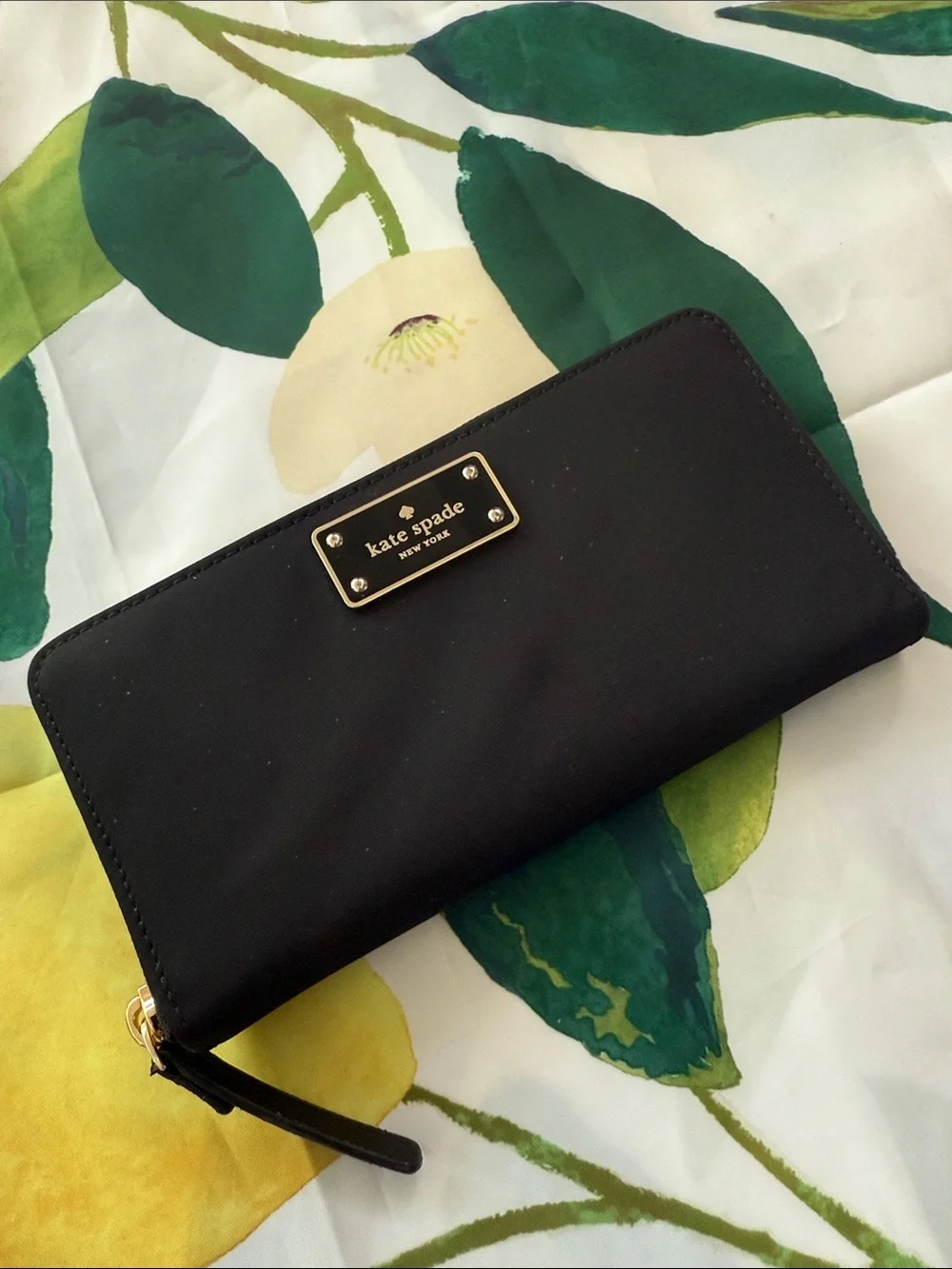 kate spade black zip-around wallet with gold plaque